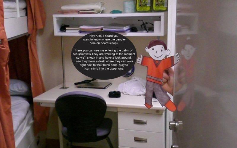 Flat Stanley looks into a cabin